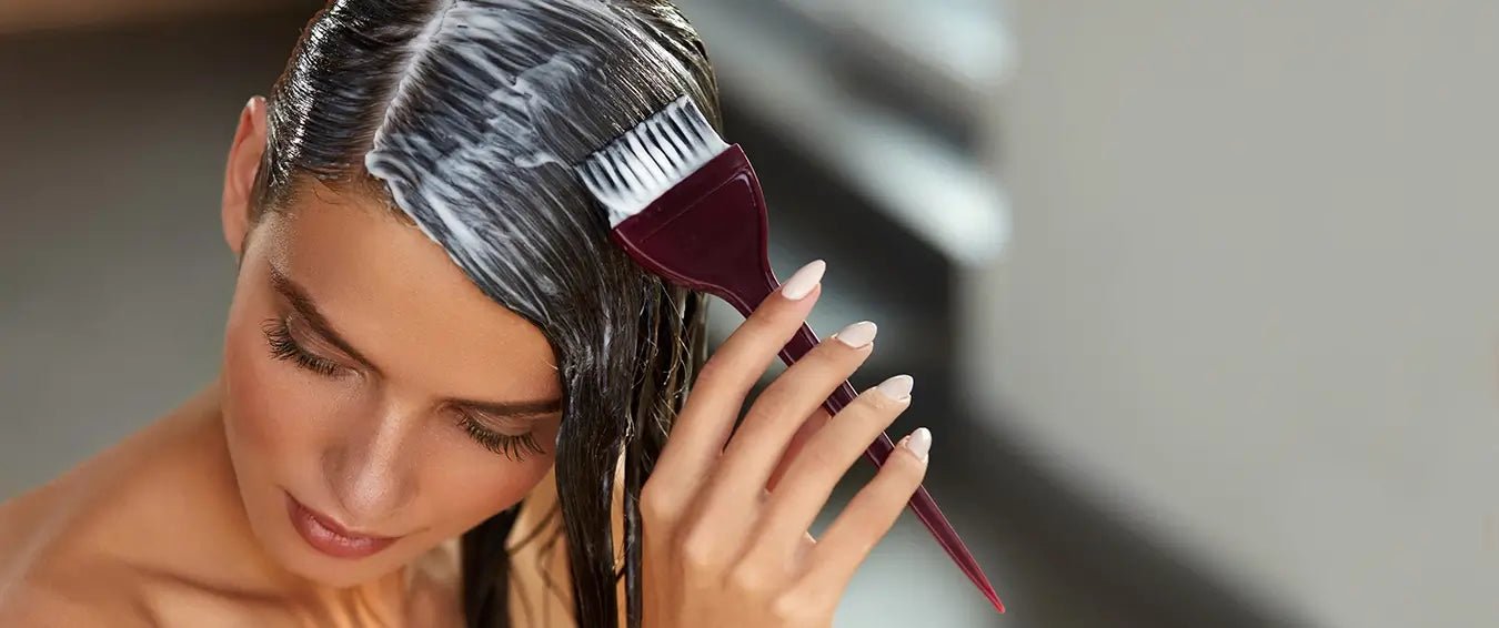 woman applying yogurt to her hair