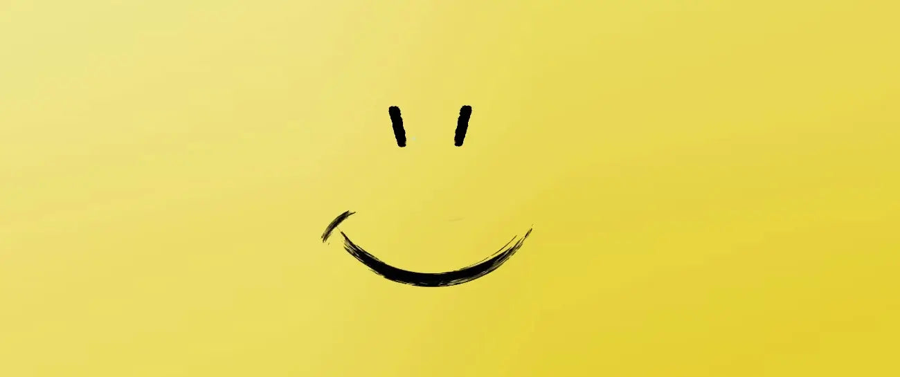 smiling face drawn on yellow surface