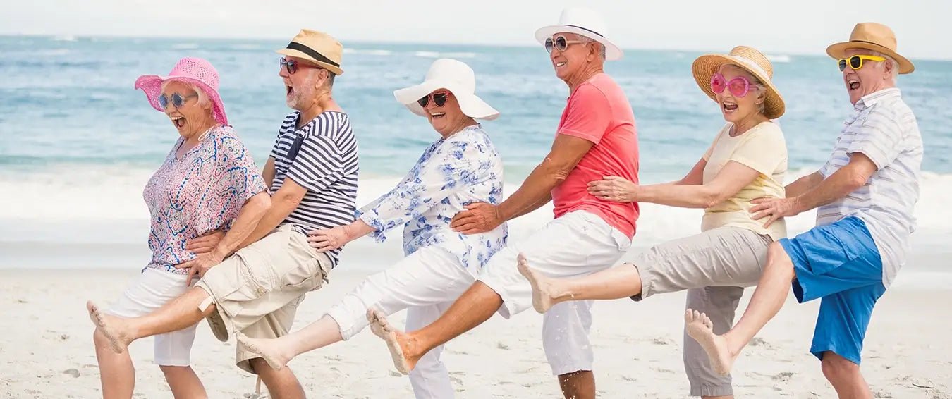 seniors having fun on the beach