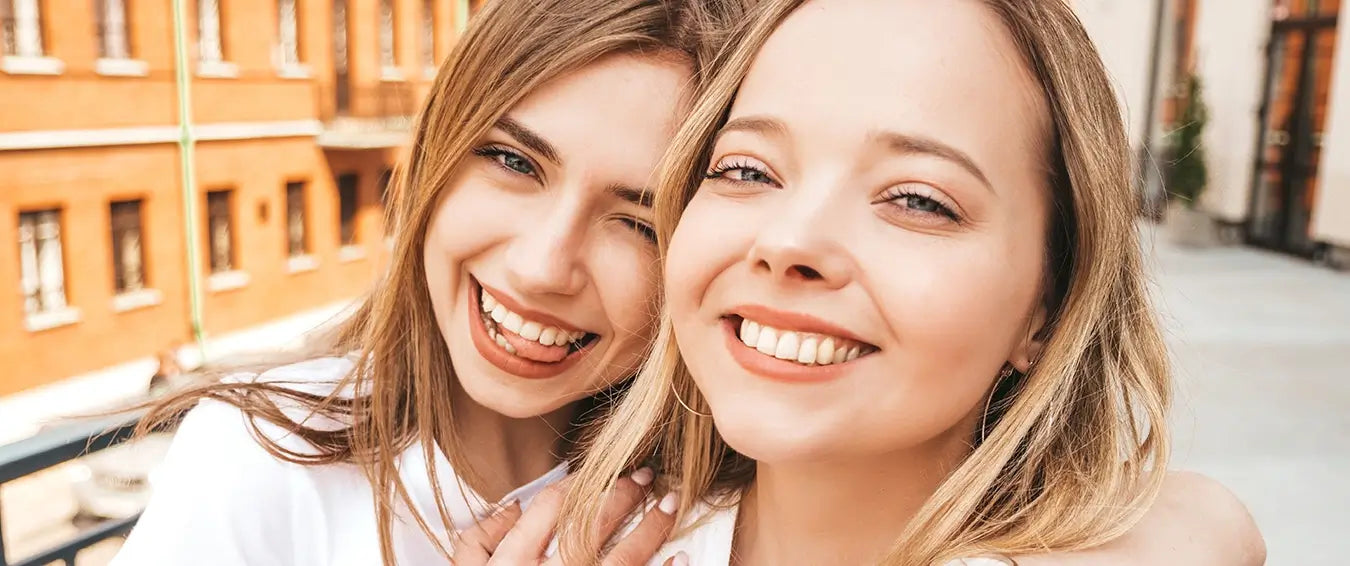 a selfie of two young women smiling