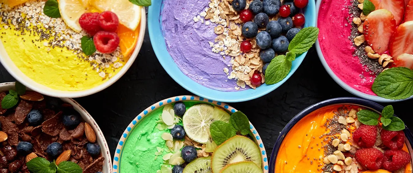 a close up of healthy smoothie bowls