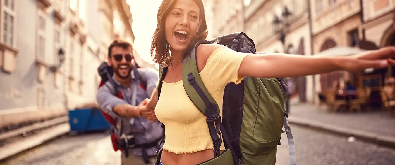 couple having fun in the street while travelling