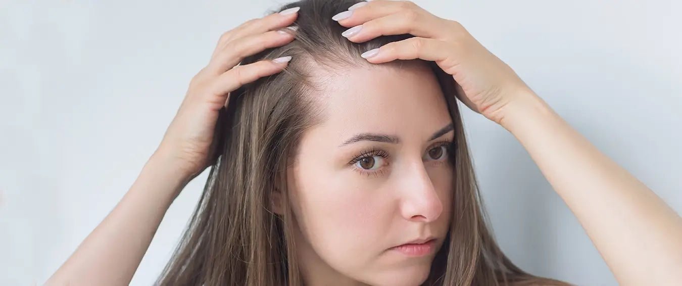 woman checking her hair