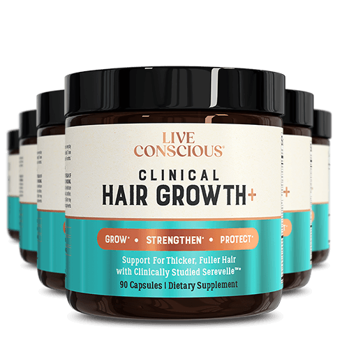 Live Conscious Clinical Hair Growth+ supplement bottles with black caps arranged in a group display, showing product label