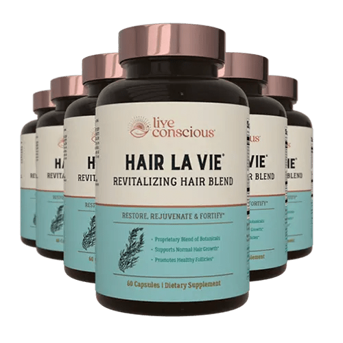 Hair La Vie Revitalizing Hair Blend dietary supplement bottles with bronze caps arranged in a group display